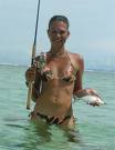 fishing the surf girl with fish